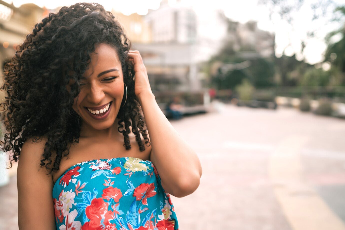 Confident Woman Laughing Outdoors